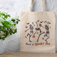 Load image into Gallery viewer, Have A Spooky Day Dancing Skeletons Halloween Canvas Tote Bag